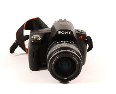 A Sony a290 digital camera, with Sony f/3.5-5.6 18-55mm lens.
