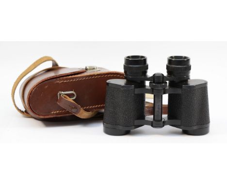 A pair of Carl Zeiss Jena Jenoptem binoculars, 8 x 30, in leather case.
