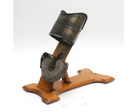 A late 19th century Kinora mutoscope viewer, with japanned hood viewer manual hand crank drive on an oak plinth base, maker's