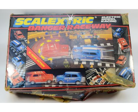 Scalextric Model Racing; Three boxed sets including Banger Raceway; Super Saloons and Grand Prix, unchecked for completeness.
