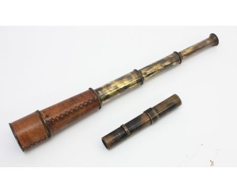 A reproduction brass three draw telescope&nbsp;together with a brass telescope sighting.