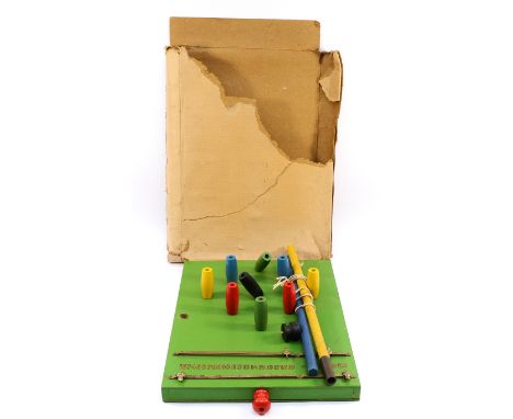 A 1950s bar skittles game, with working knob to return the skittles to an upright position, H-3cm x L-41 x W-30.5.
