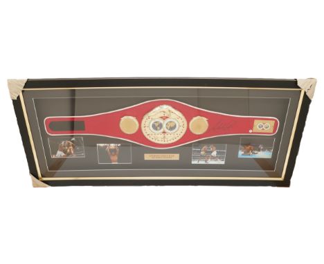 Elite Framing Memorabilia; A framed montage Anthony Joshua M.B.E signed replica I.B.F (International Boxing Federation) belt,
