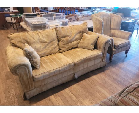 A Barker &amp; Stonehouse 'Summerset' three seater sofa, having reversible feather filled back cushions and fibre filled seat