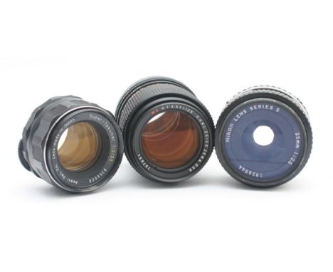 Three camera lenses, to include, a Nikon Series E f/2.5 35mm lens, a Carl Zeiss Jena f/3.5 135mm, and Asahi Super-Takumar f/2