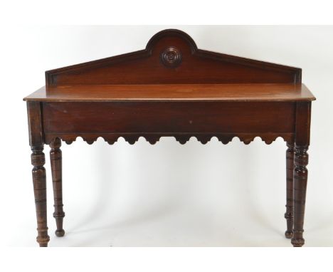 Mahogany hall table, with front apron and & bullseye pediment. W122cm d41cm h101cmAreas of light water damage to top. 