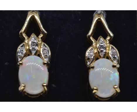 Pair of 9ct gold, opal & diamond pendant earrings, length 20mm, gross weight 3.08 grams 