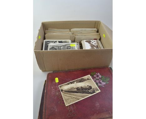 Two vintage postcard albums and contents plus large quantity of loose postcards 
