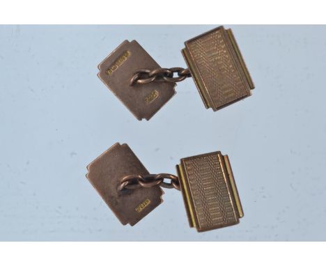 Pair of 9ct gold cufflinks, with engine-turned decoration, gross weight 7.97 grams 