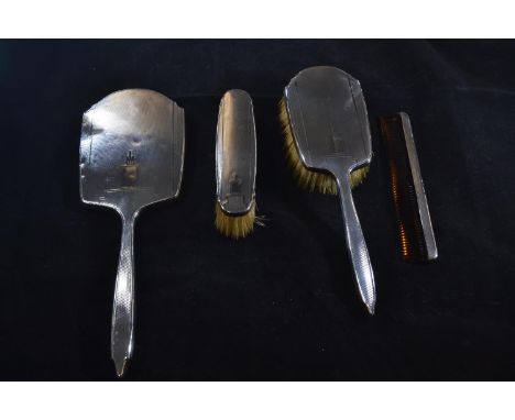 Four piece silver mounted dressing table set, maker WN LTD, Birmingham 1936, comprising mirror, hair brush, comb & clothes br