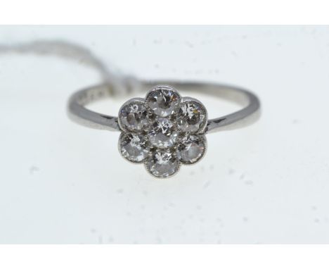 Platinum (tested) & diamond flower ring, size K, 2.25 grams 