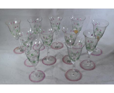 Part set of eleven Orrefors 'Linnea' pattern painted wine glasses, two AF One with crack to rim &amp; one with small nick to 