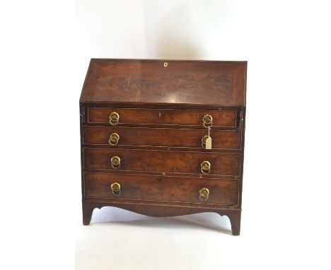 Georgian mahogany 4 drawer bureau, with circular drop handles. 5 internal drawers with lockable compartment (includes key). O