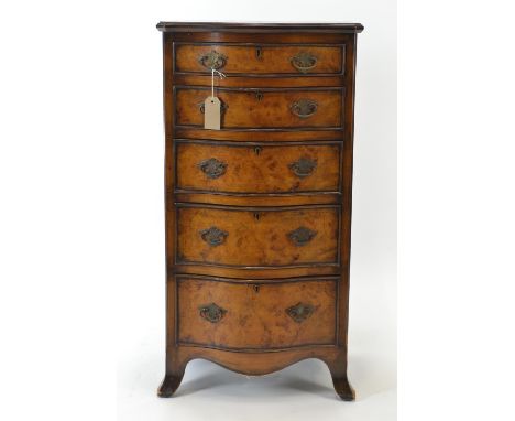 Early C20 chest of drawers in burr walnut, with crossbanded top over 5 serpentine shape drawers. Raised on splayed bracket su