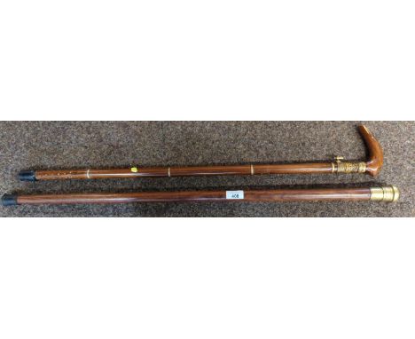 Sword stick with inlaid handle & a brass topped compass walking stick. 