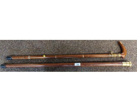 Sword stick with inlaid handle & a brass topped compass walking stick. 