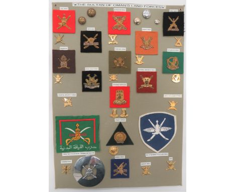 Sultan of Oman - 31 Items Of Insigniadisplay board with good tabulated display of metal and cloth badges including N Frontier