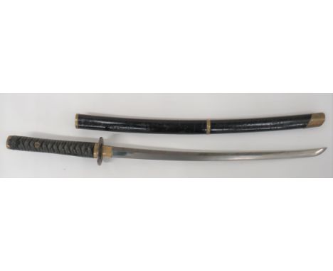 Mid 20th Century Japanese Katana Sword26 1/2 inch, single edged polished blade of typical form.  Brass kabuki.  Steel tsuba. 