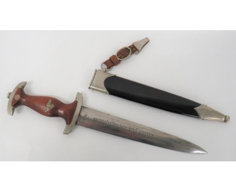 German Third Reich NSKK Dagger and Hanging Strap8 3/4 inch, double edged blade etched "Alles Fur Deutschland".  Reverse with 