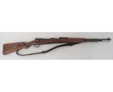Deactivated WW2 German K98 Mauser Rifle7.92 mm, 23 3/4 inch, blued barrel.  Front blade sight and rear ladder sight.  Breech 