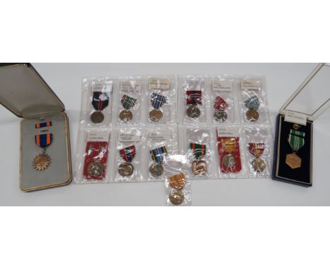 Collection Of 15 American Medalsincluding boxed Air medal ... Boxed medal for Merit ... Air Force Good Conduct medal ... Army