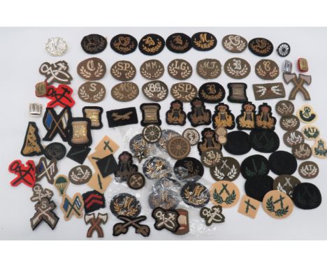 95 Various Trade & Qualification Arm Badgesincluding letters within wreath MT ... SP ... LG ... BG ... MG ... MM ... B ... S 
