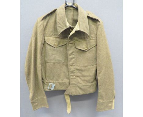 1940 Pattern British Battledress Jacket Dated 1944khaki woollen, single breasted, closed collar, short jacket.  Patch chest p