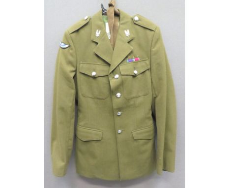 Special Air Service Other Ranks No 2 Uniformkhaki, single breasted, open collar tunic.  Patch chest pockets with buttoned fla