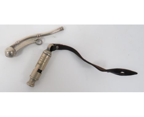 WW1 Trench Whistle Dated 1917white metal tubular whistle with maker Ade Couroy & Co dated 1917.  Complete with leather securi