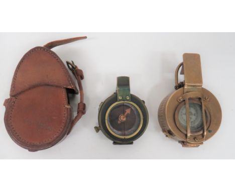 1917 Dated Military Compassbrass compass with flip up, glazed top.  Base dated 1917.  Complete in its leather case.  Stamped 
