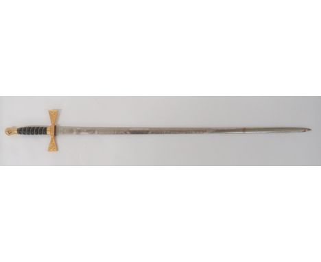 Post 1953 Wilkinson Sword Irish Commemorative Sword30 inch, double edged, nickel plated blade.  One side etched with Celtic s