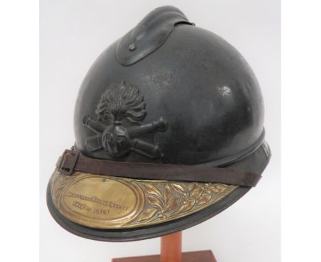 WW1 Period French Artillery Helmetblue grey painted crown with top attached comb.  Lower attached, two part brim with side jo