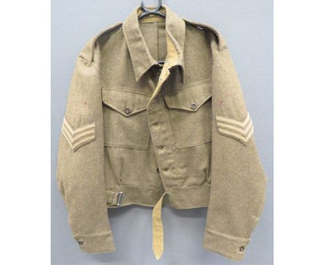 1940 Pattern British Battledress Jacket Dated 1943khaki woollen, single breasted, closed collar, short jacket.  Patch chest p