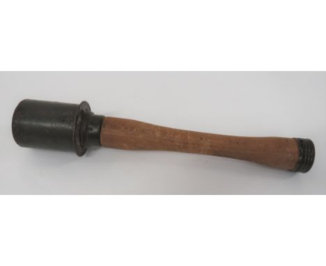 WW2 Period Inert German Stick Grenade green painted, small tin canister top. &nbsp;Wooden handle with lower, screw off base c