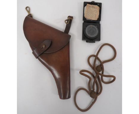 British Military Equipmentconsisting MKII magnetic machine compass in black composite case ... Brown leather revolver holster