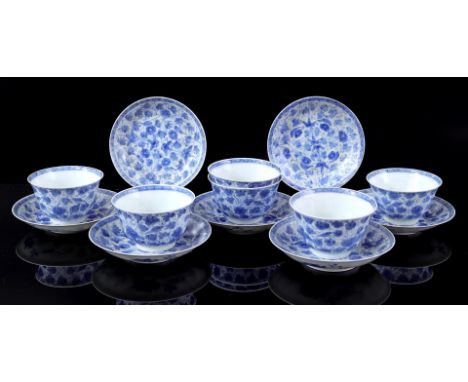6 porcelain cups and 7 saucers with blue floral decoration, Japan 19th century (2 saucers with 1 chip, 1 cup glued, 1 cup wit