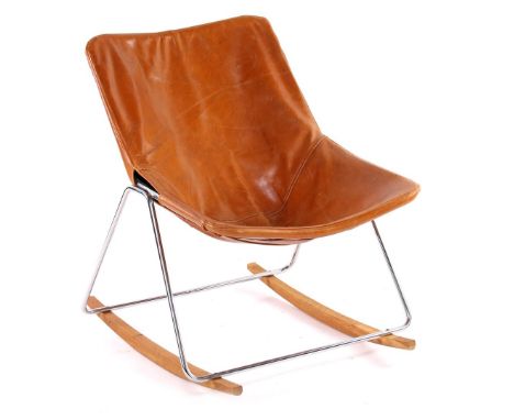 Pierre Guariche (1926-)Rocking chair with cognac leather seat, chromed metal base and standing on oak slats, design Pierre Gu