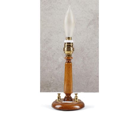 Lamp on wooden base. For determining the power consumption. Lamp base with carbon filament lamp, 24 cm high