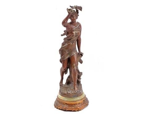 Zamak statue entitled "Coup de Soleil", by Ferrand, on onyx base in copper base ring, 35.5 cm high