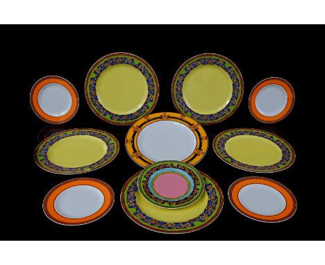 11 porcelain Rosenthal Versace dishes with Russian Dream decor, Barroco and with orange pattern, largest 27 cm diameter