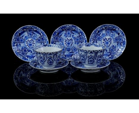 5 contoured dishes with blue decoration of landscape and flowers, Kangxi marked, China 19th century, 12 cm diameter (chips, 1