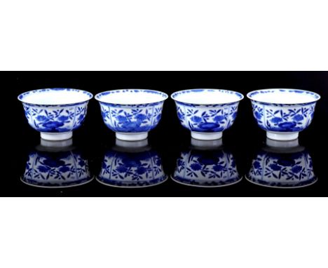 4 cups with blue decoration of flowers near rock, marked, China Kangxi period ca. 1700 (1 cup with chip, 1 cup with small hai