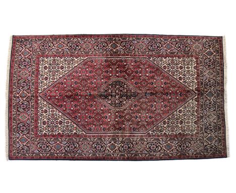Hand-knotted wool carpet with oriental decor, 225x140 cm