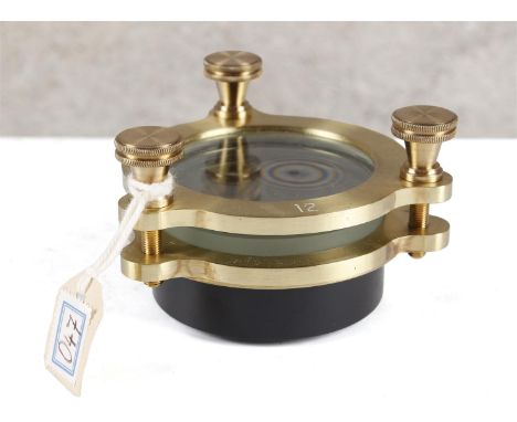 Newton's ring. Optical instrument. Newton's rings are rings created by interference of light reflected between two surfaces t