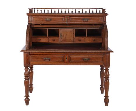 Oak cylinder desk with gate on top, 2 drawers, 4 drawers in nest, door, 4 open compartments, artificial leather glued top and