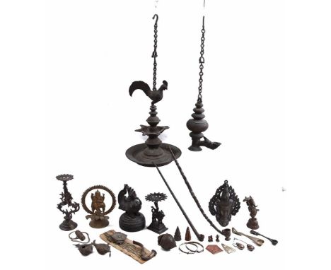 Lot of oriental bronze and copper objects including oil lamps, figurines, storage tubes, opium pipes, opium weight, etc., lar