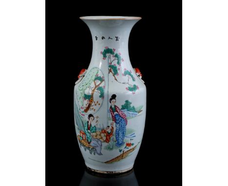 Porcelain Qianjiang Cai vase with polychrome decor of ladies and fools in a garden, China 19th century, 42.5 cm high, on loos
