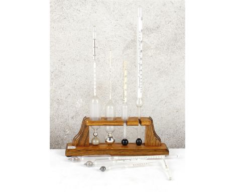 8 aerometers. Determining specific gravity of liquids. Various aerometers according to Baumé for light and heavy liquids at d