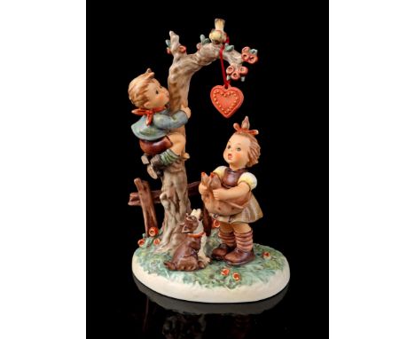 Goebel Hummel sculpture group entitled "Ein Herz für Dich/ Here's My Heart", number 766, TMK-7 1991-2000, from the Century Co