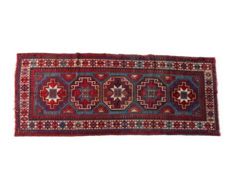 Hand-knotted wool carpet with oriental decor, 310x142 cm (restoration spots)